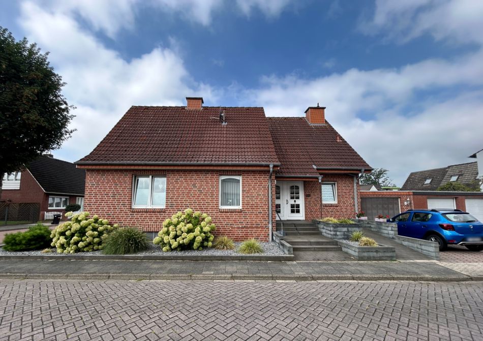 Charmantes Einfamilienhaus 
mit Wintergarten, Teilkeller u. Garage 
in Rheine-Eschendorf